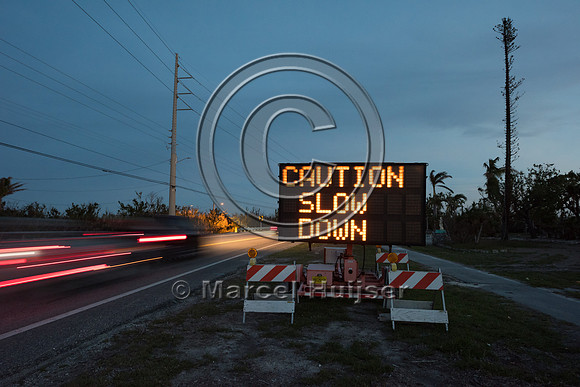 Variable message sign, Caution, slow down, Key deer crossing ahe