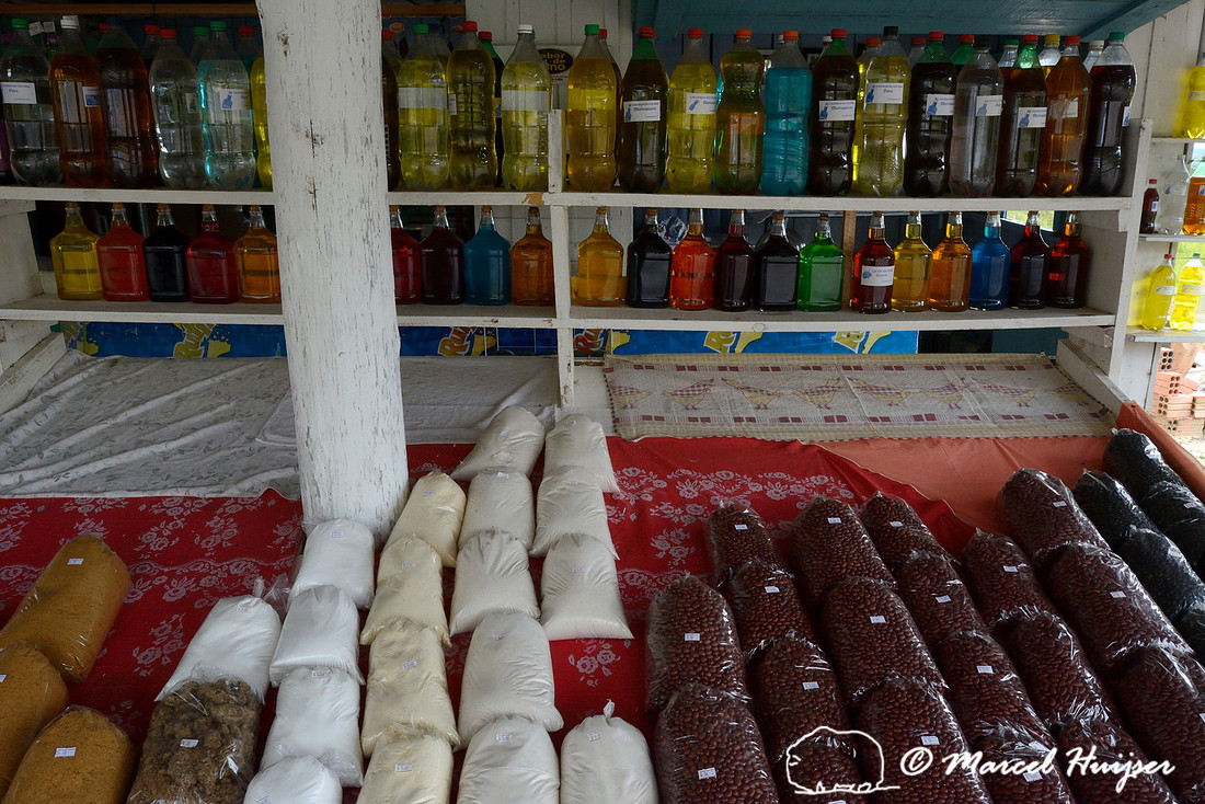 Beans, other food and homemade Cachaça (made from sugarcane juice), roadside stand, Rio Grande do Sul, Brazil