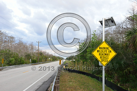 Animal detection system warning sign and solar panel, Tamiami Trail, US Hwy 41, Florida, USA