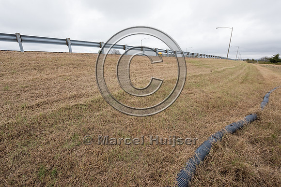 Plastic corrugated pipe designed as a barrier to keep Northern d
