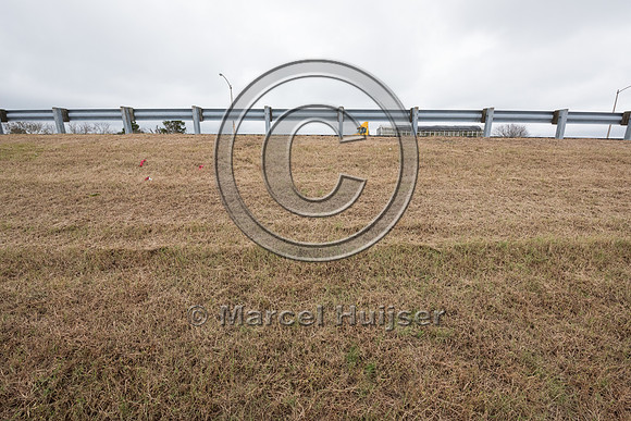 Roadbed, potential for drilling culverts under highway to allow