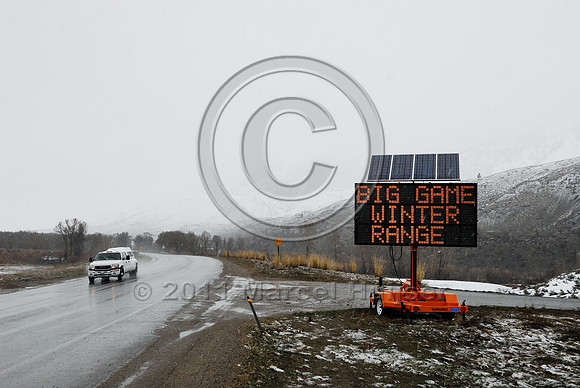 Wildlife warning sign, variable message sign, Big Game winter range Next 5 miles be alert, WY