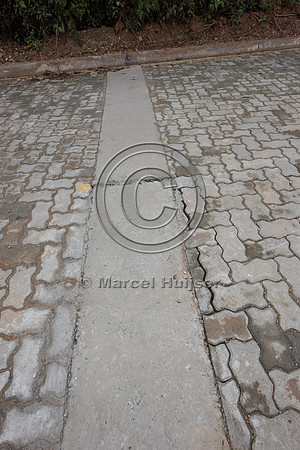 The concrete strip to stabilize pavers,  Brazil