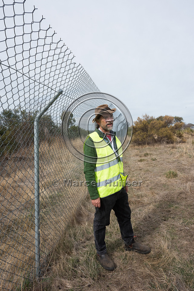 Fence designed to keep koala  (Phascolarctos cinereus) off the h