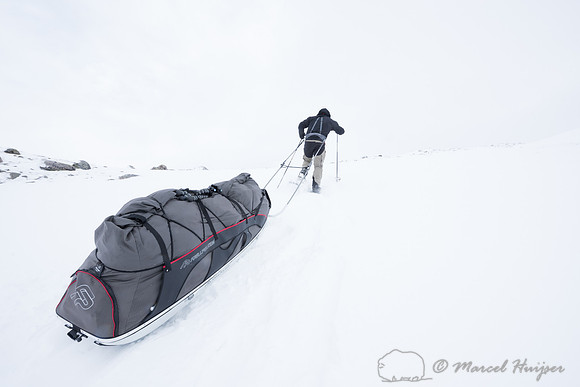 Niels Kooijman drags his sled to second camp, Dovrefjell, Norway