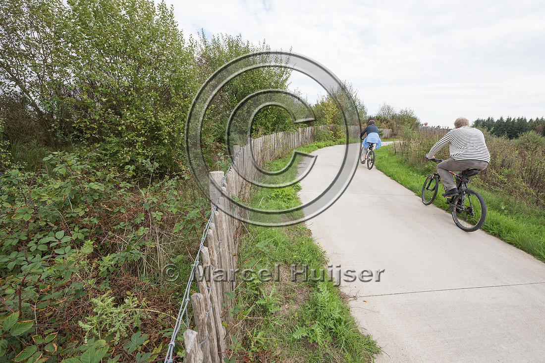 Hiking and biking trail combined with wildlife overpass across r