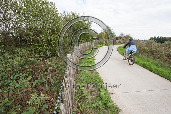 Hiking and biking trail combined with wildlife overpass across r