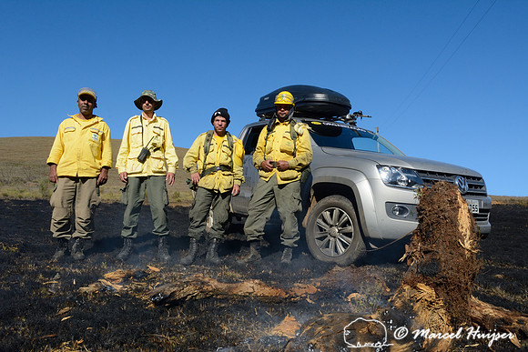 The fire fighters pose with the Volkswagen Amarok after putting out the fire, Parque Nacional da Serra da Bocaina, São Paulo, Brazil