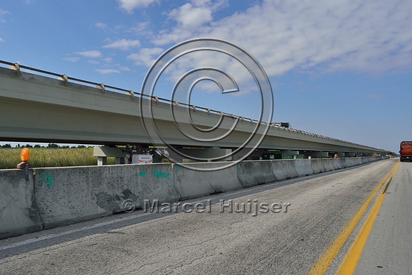 Construction of long bridge elevating Tamiami Trail (US Hwy 41), Everglades, Florida, USA