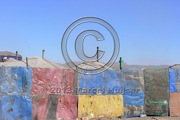 Gers covered in coal dust at the settlement of Tsagaan khad (White Rock), north of Gashuun-Sukhait, Gobi, Mongolia
