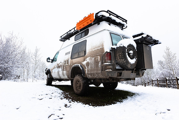 Camper van in snow, Centennial Valley, Montana, USA