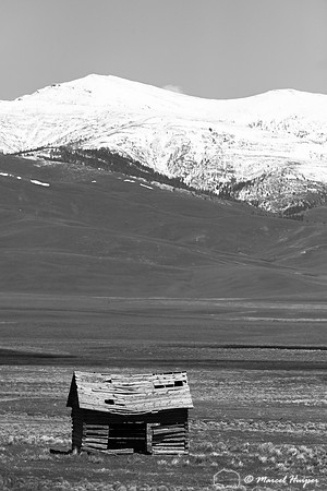 Old shed and mountains,  Centennial Valley, Montana, USA
