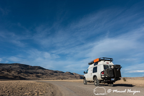 Camper van on dirt road, Montana
