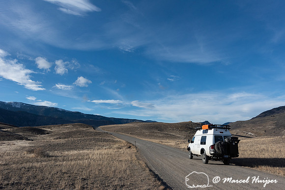 Camper van on dirt road, Montana
