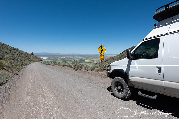 Camper van on gravel road, Warner Valley, Hart Mountain National