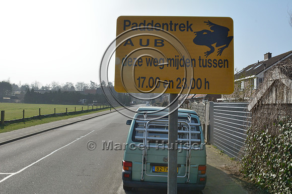 Wildlife warning sign, Voluntary road closure at night between 5 and 11 pm during spring migration of common toads (Bufo bufo), Soest, The Netherlands