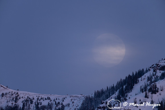 Moonrise and mountain, Wyoming, USA