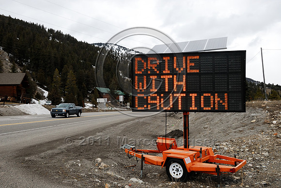 Wildlife warning sign, variable message sign, Drive with caution Animals on roadway, MT