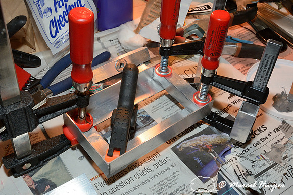 Marcel Huijser makes custom brackets for sensors that detect wildlife and that hook up to his cameras