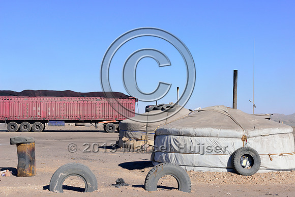 Gers covered in coal dust at the settlement of Tsagaan khad (White Rock), north of Gashuun-Sukhait, Gobi, Mongolia