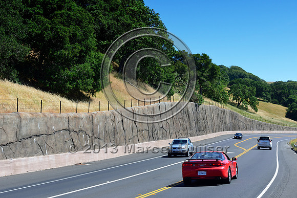 Retaining wall with rock pattern, California, USA