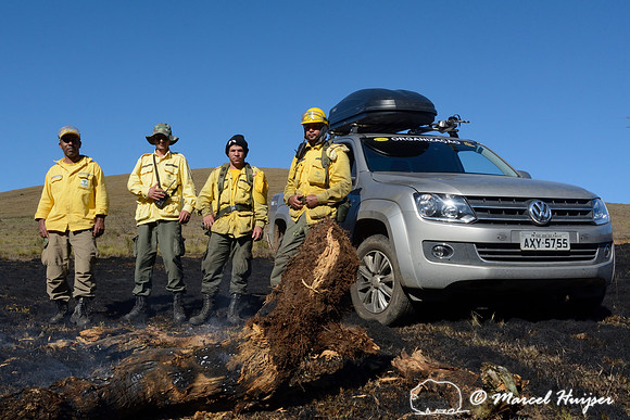 The fire fighters pose with the Volkswagen Amarok after putting out the fire, Parque Nacional da Serra da Bocaina, São Paulo, Brazil