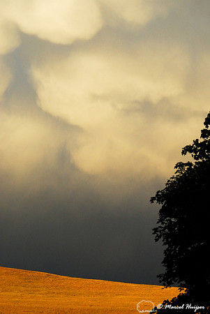 Mammatus and thunderstorm clouds and North Hills, Missoula, Montana, USA