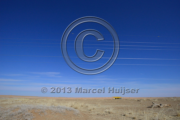 Power lines with markers for birds to reduce bird strikes, between Hanbogd and Oyu Tolgoi, near Hanbogd, Ömnögovi, Mongolia