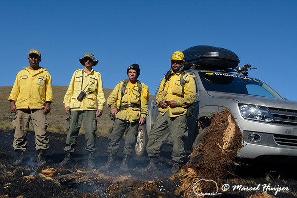 The fire fighters pose with the Volkswagen Amarok after putting out the fire, Parque Nacional da Serra da Bocaina, São Paulo, Brazil