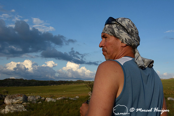 Marcello (Canastra 4x4) on the lookout for wildlife, Parque Nacional da Serra da Canastra, Minas Gerais, Brazil