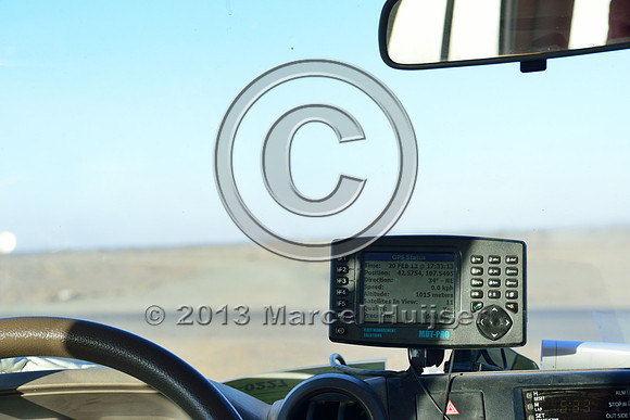 GPS data logger and transmitter inside Oyu Tolgoi mine vehicle for fleet management and safety, Gobi, Mongolia