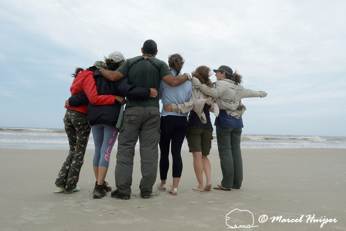 Right to left, Bethanie Walder, Fernanda Zimmermann Teixeira, Larissa Oliveira Gonçalves, Diogenes Borges Machado, Paula Pinheiro, Gabriela Schuck, coast at Lagoa do Peixe, Rio Grande do Sul, Brazil