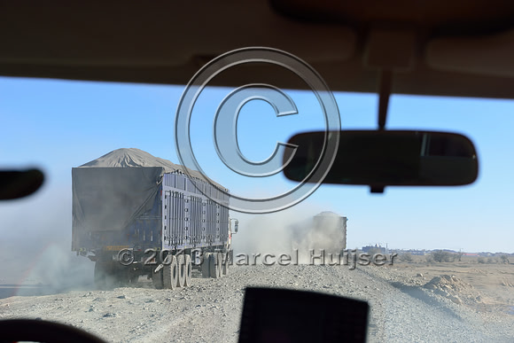 Coal trucks approaching Gashuun-Sukhait, Gobi, Mongolia
