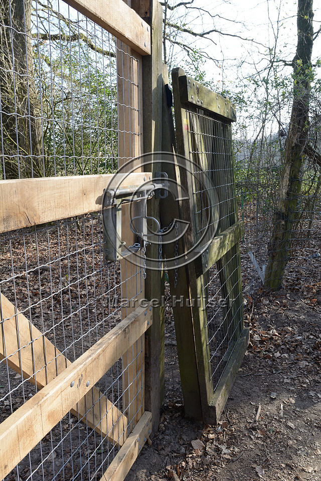 Swing gate, set at an angle so it closes through gravity, The Netherlands