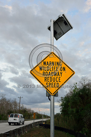 Animal detection system warning sign and solar panel, Tamiami Trail, US Hwy 41, Florida, USA