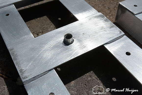 Marcel Huijser makes custom brackets for sensors that detect wildlife and that hook up to his cameras