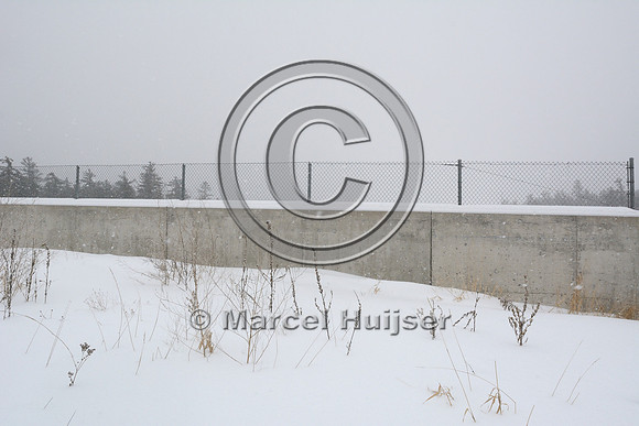 Barrier for animals, sound and light on top of wildlife overpass, Hwy 69, Ontario, Canada
