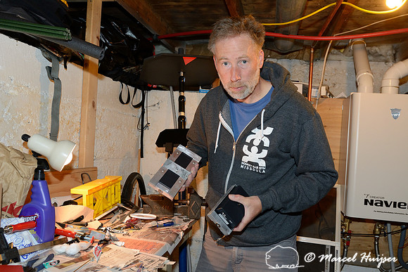 Marcel Huijser makes custom brackets for sensors that detect wildlife and that hook up to his cameras