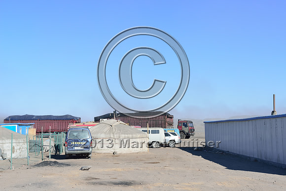 Gers covered in coal dust at the settlement of Tsagaan khad (White Rock), north of Gashuun-Sukhait, Gobi, Mongolia