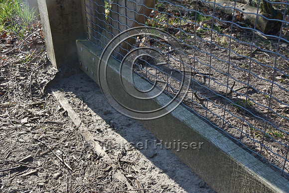 Snug fit of a gate at a wildlife fence, south of Otterlo, The Netherlands