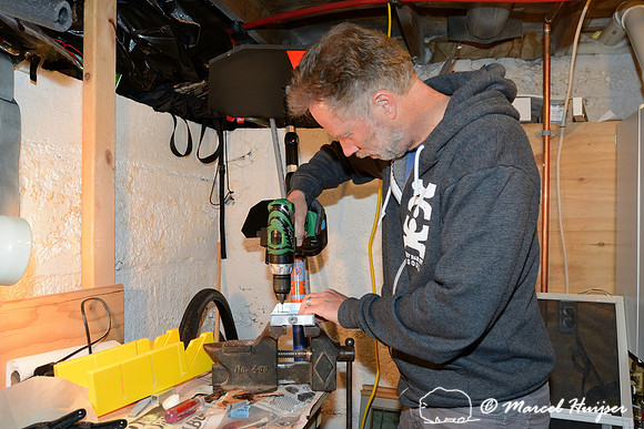Marcel Huijser makes custom brackets for sensors that detect wildlife and that hook up to his cameras