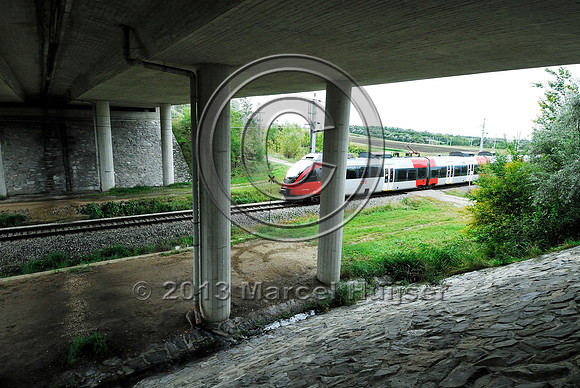 Railroad and farm road at multifunctional underpass, under A4 motorway, Parndorf, Austria