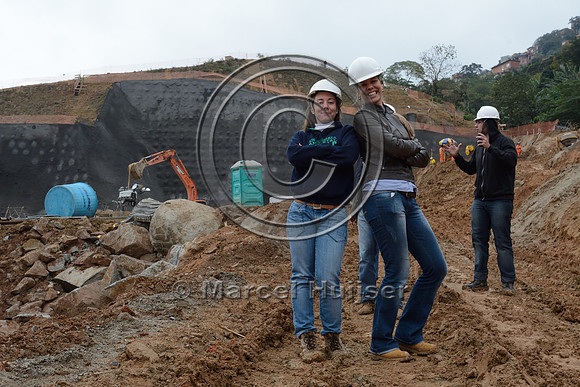 Jamille Consulin and Fernanda Abra at construction site of the northern outer beltway (Rodoanel Norte) through former favela (slums), São Paulo, Brazil