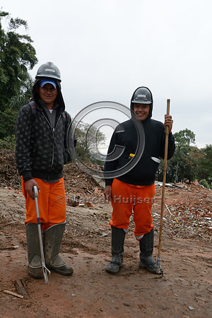 Cristiano and Reinaldo, two of the people who catch and remove animals and plants from the path of the new motorway Rodoanel Norte, Greater São Paulo, Brazil