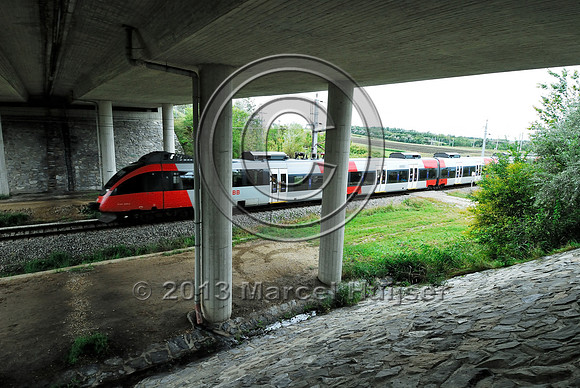 Railroad and farm road at multifunctional underpass, under A4 motorway, Parndorf, Austria