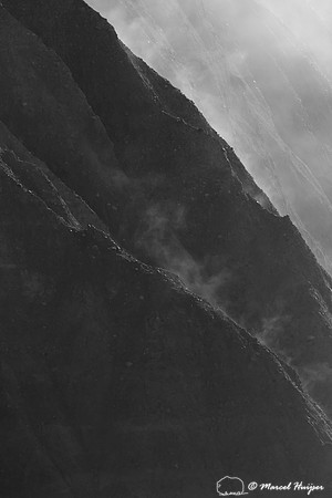 Cliffs in morning fog above Yellowstone River at Tower Falls, Wy