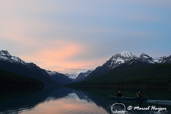 Evening canoeists at Bowman Lake, Glacier National Park, Montana, USA