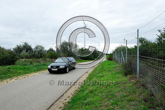 Low volume road and bicycle path at multifunctional overpass (wildlife, bicyclists, pedestrians; about 100 m wide), across A4 motorway, Parndorf, Austria
