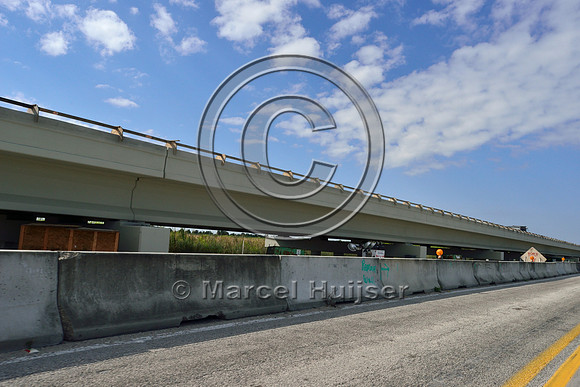 Construction of long bridge elevating Tamiami Trail (US Hwy 41), Everglades, Florida, USA