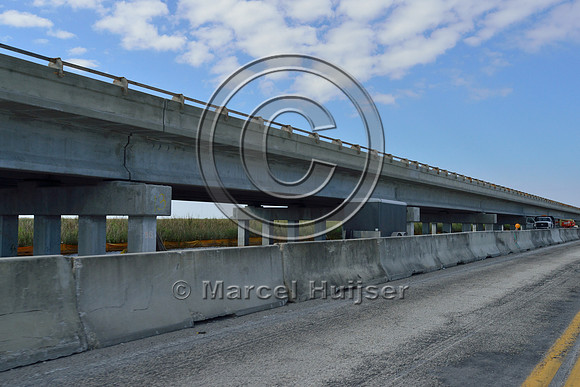 Construction of long bridge elevating Tamiami Trail (US Hwy 41), Everglades, Florida, USA